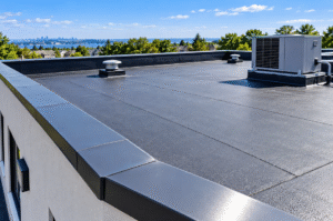 How New Jersey Weather Affects Flat Roofs and What You Can Do About It